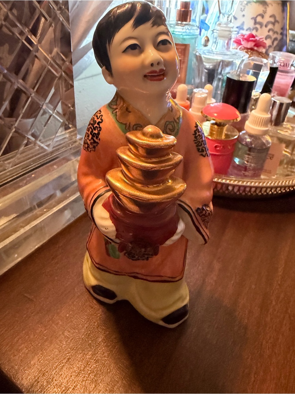 Hand-painted vintage Chinese porcelain “ Golden Boy”, holding gold pots